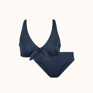Lively swimsuit. 80% recycled materials. High-waisted bottom, plunge top.